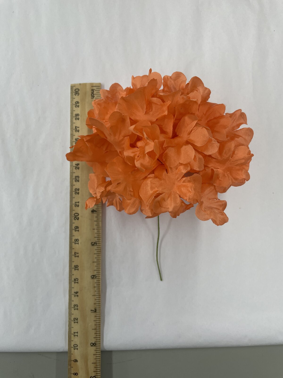 Second flower prototype, orange silk rhododendron with ruler for scale